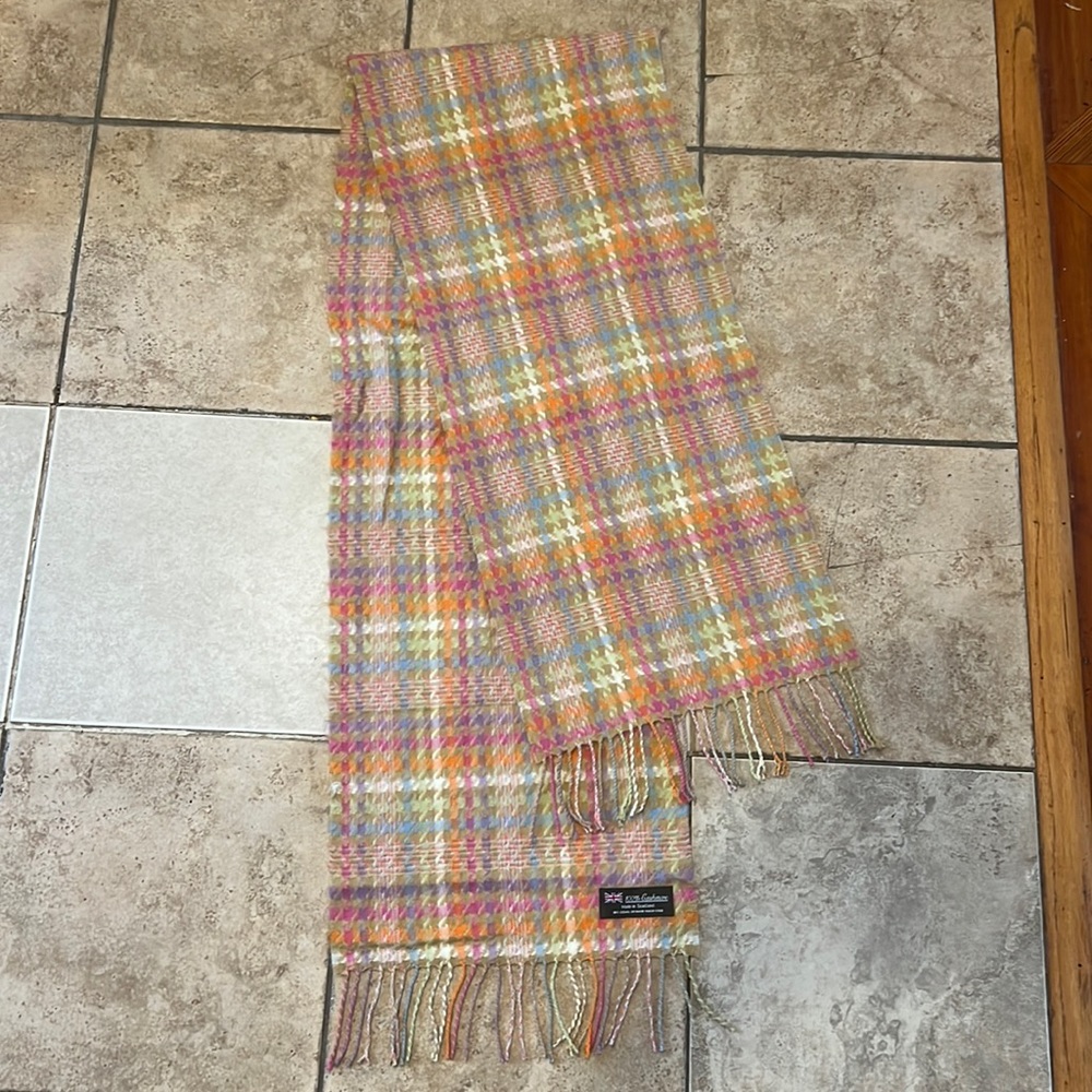 Vibrant pick orange blue green purple and tan cashmere scarf made in Scotland